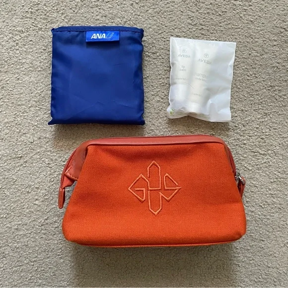 Ettinger London x ANA Airlines with Aveda Amenity Travel Kit Pouch Case Orange - Picture 2 of 4